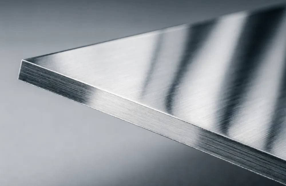 Brushed stainless steel sheet with a cut edge